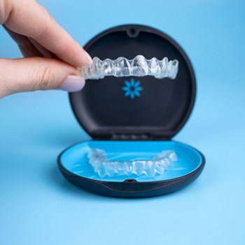 aligners going into their case 