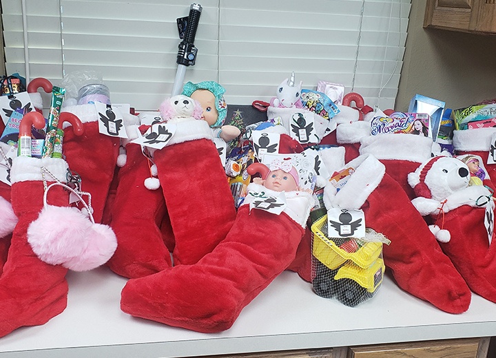 Several red stockings filled with toys