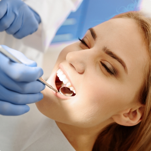 Woman having her teeth examined during dental checkup in Weatherford