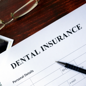 Dental insurance form on table