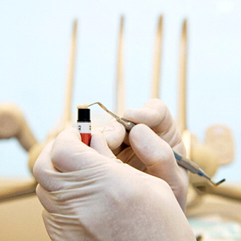 a dentist working with direct bondings composite resin