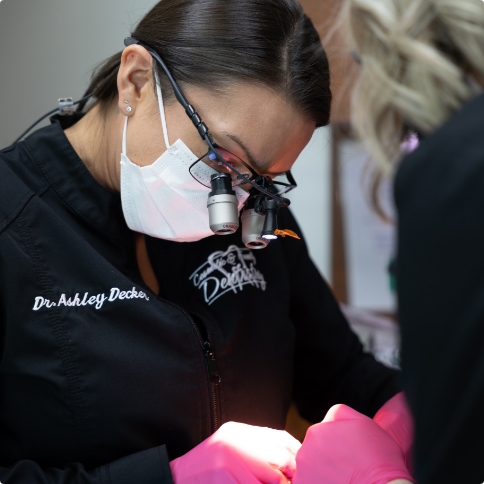 Emergency dentist treating a dental patient