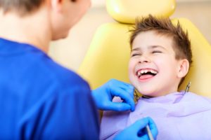 Smiling child in dentist's chair