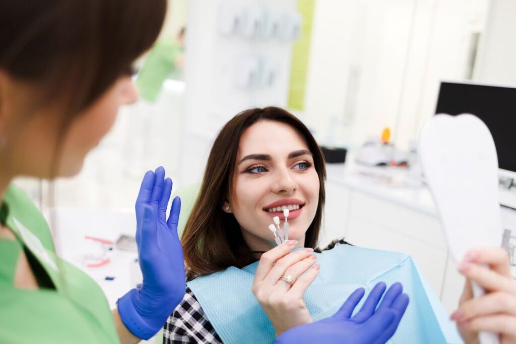 A woman getting veneers at the dentist