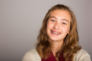 preteen girl with braces
