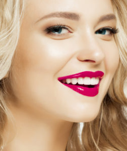 Woman with gorgeous smile following teeth whitening