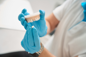 a close-up of a model of a dental crown